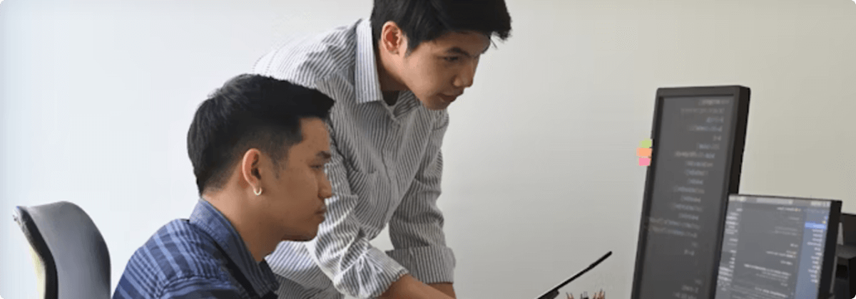 Professionals collaborating on an electronics project about act technology